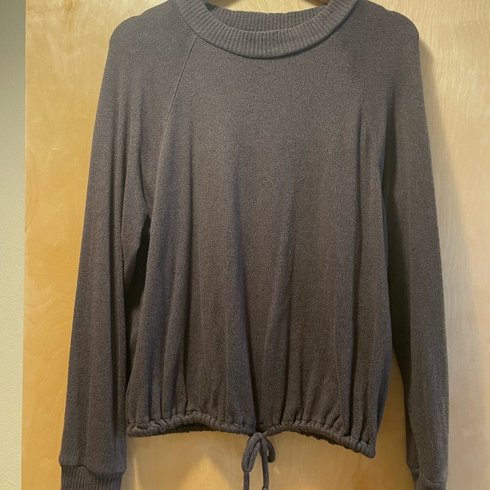 Drawstring waist, crew neck, soft barely worn sweater.